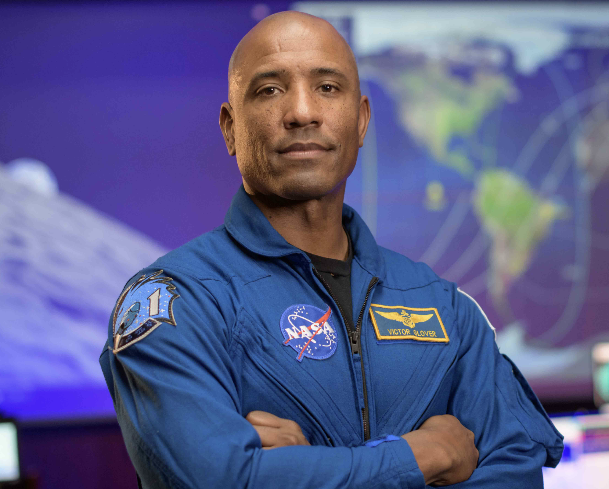 Victor Glover, the first Black astronaut to travel to the Moon, in his NASA spacesuit.