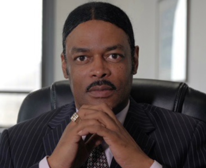 Isaac Wright Jr. standing confidently in a courtroom setting.