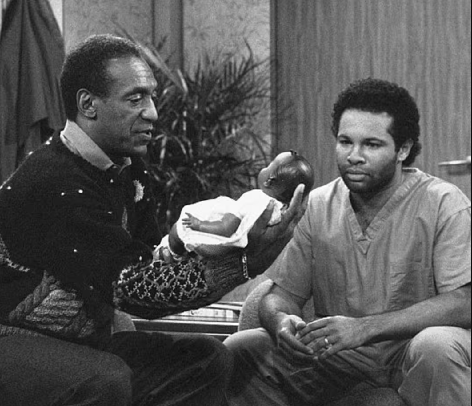 Geoffrey Owens smiling and looking towards the camera.