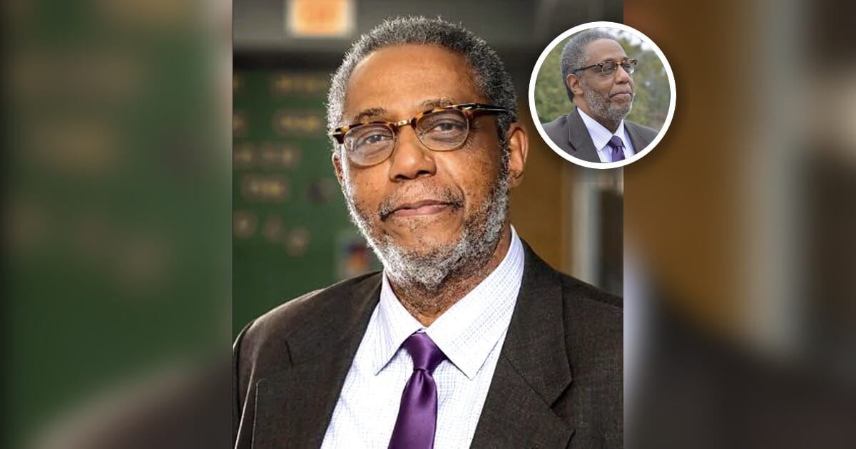 Henry Darby working at Walmart to support his students